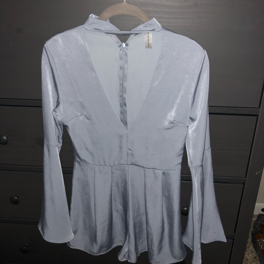 NEVER WORN Long sleeve blue romper
